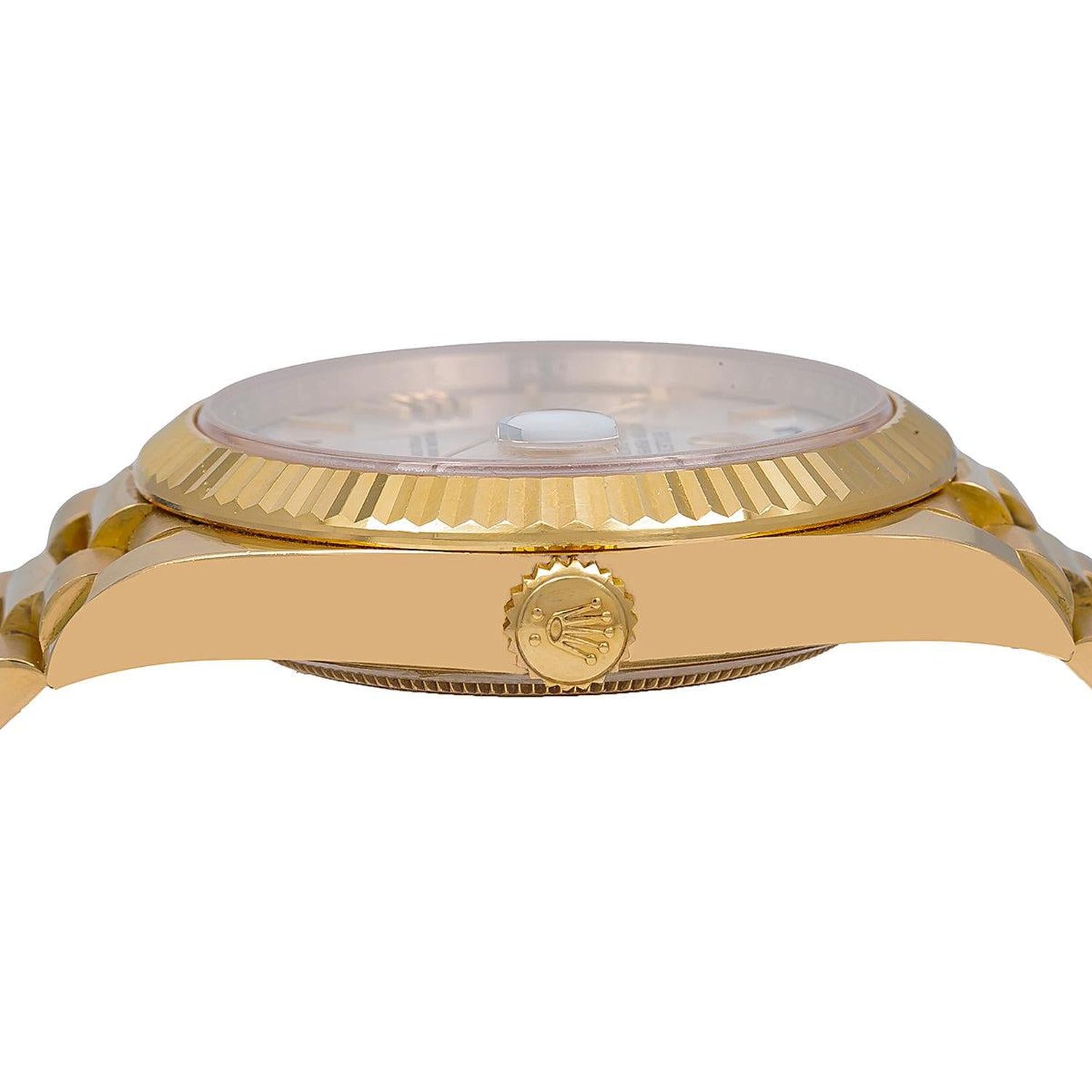 Rolex Day-Date 40MM 228238 Silver Roman Dial Fluted Bezel 18K Yellow Gold President Bracelet