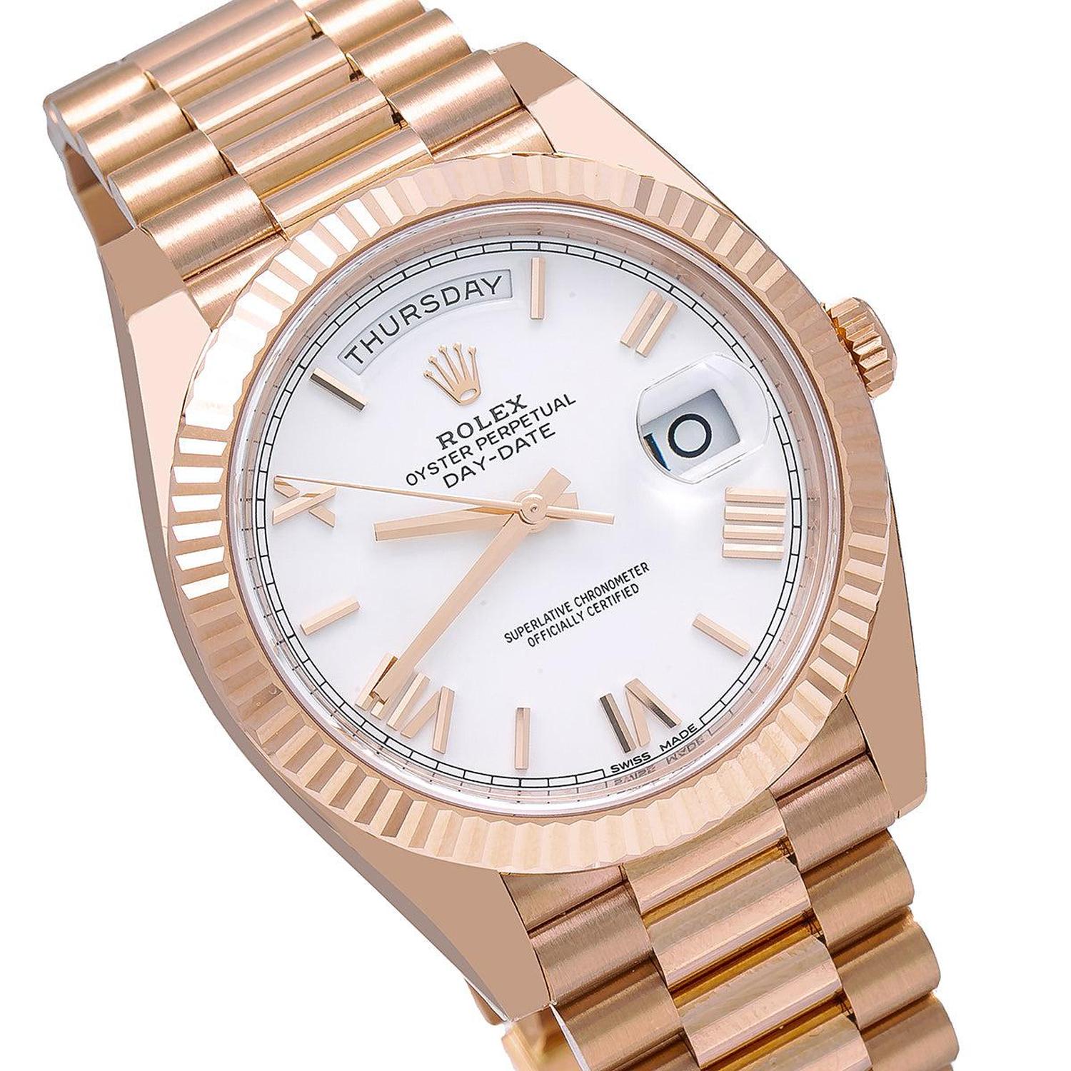 Rolex Day-Date 40MM 228235 White Roman Dial Fluted Bezel 18K Rose Gold President Bracelet