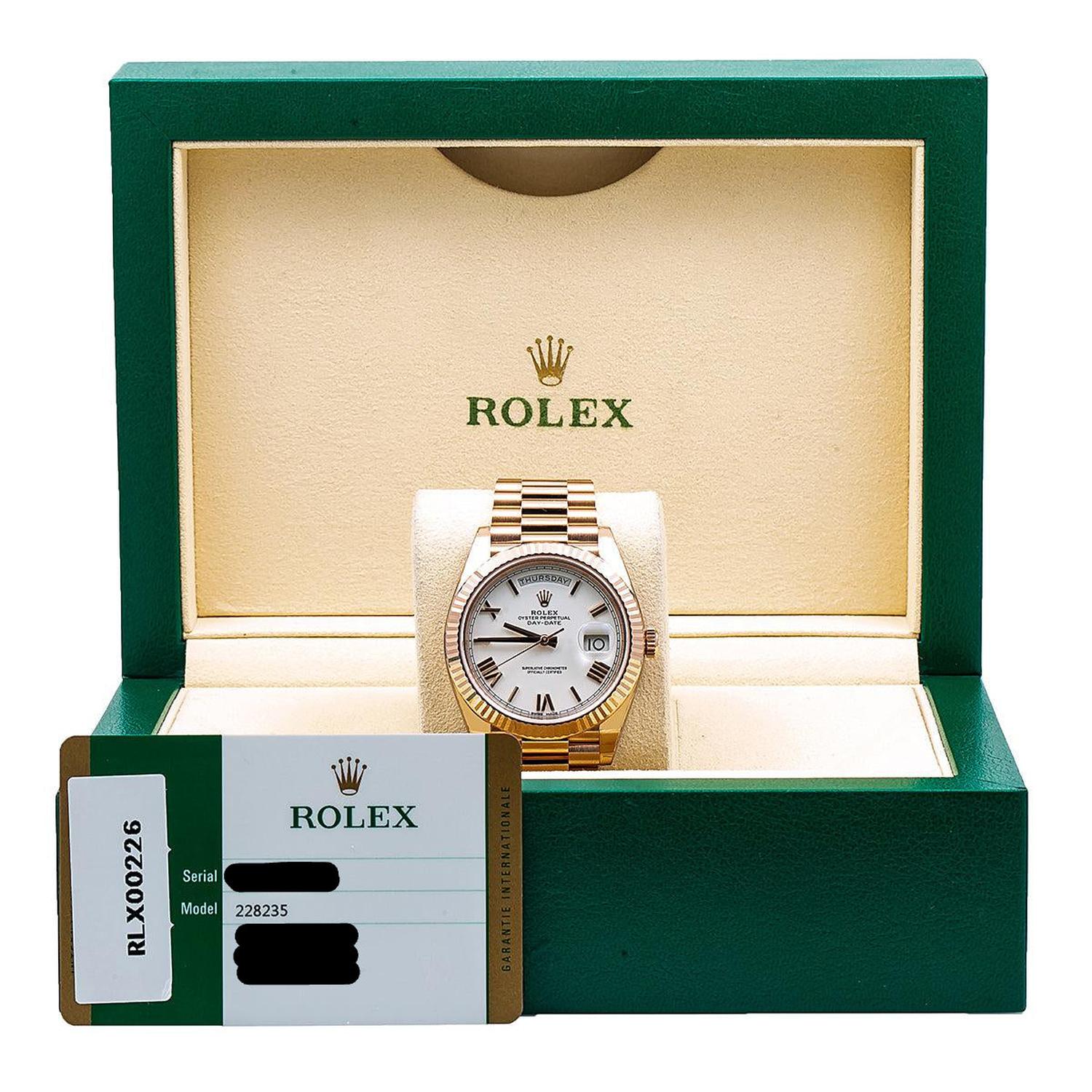 Rolex Day-Date 40MM 228235 White Roman Dial Fluted Bezel 18K Rose Gold President Bracelet