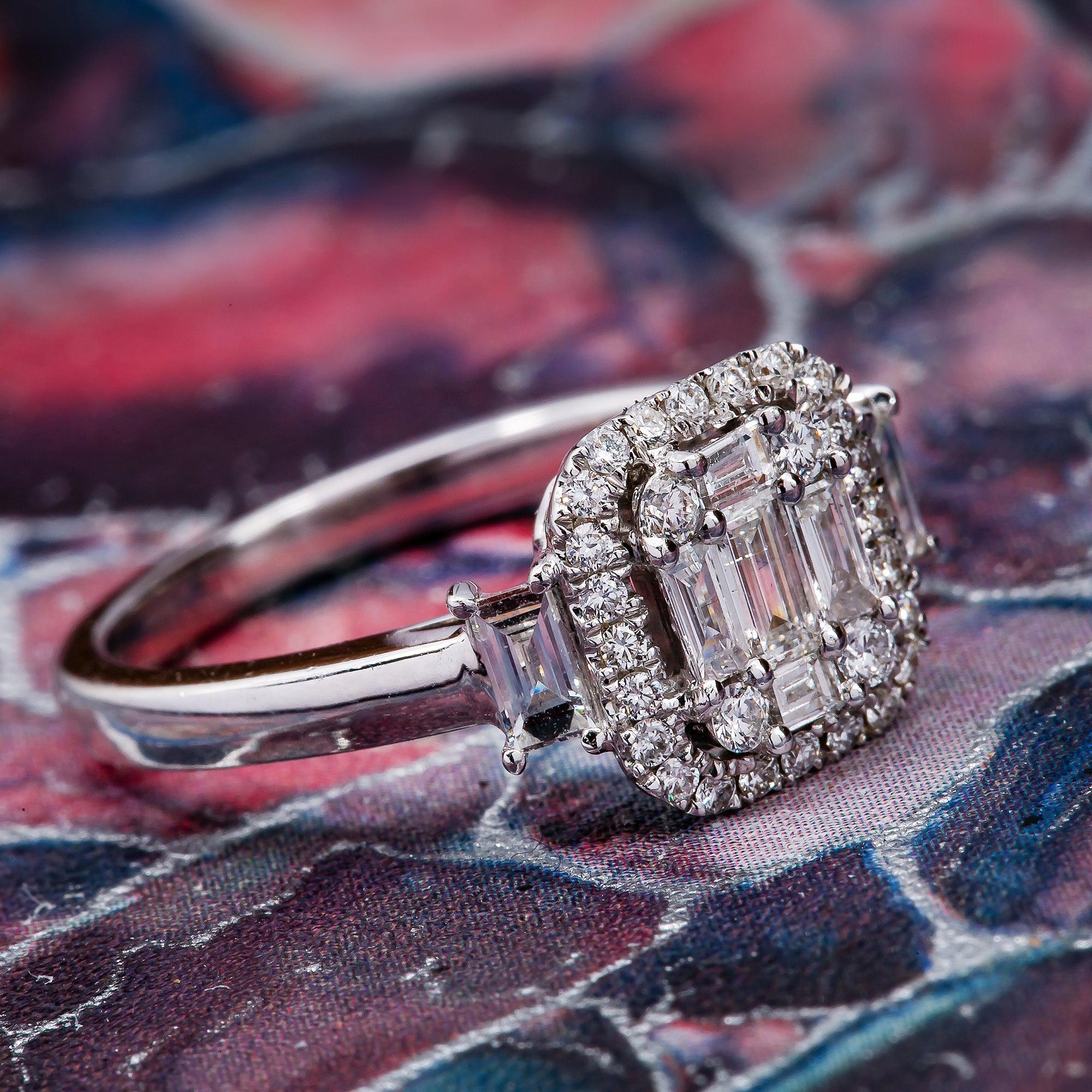 LADIES 18K WHITE GOLD ENGAGEMENT RING WITH BAGUETTE AND ROUND CUT DIAMONDS