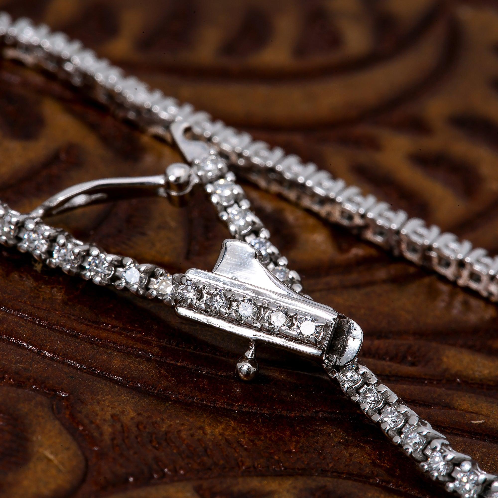 14K WHITE GOLD TENNIS BRACELET WITH 1.04 CT DIAMONDS