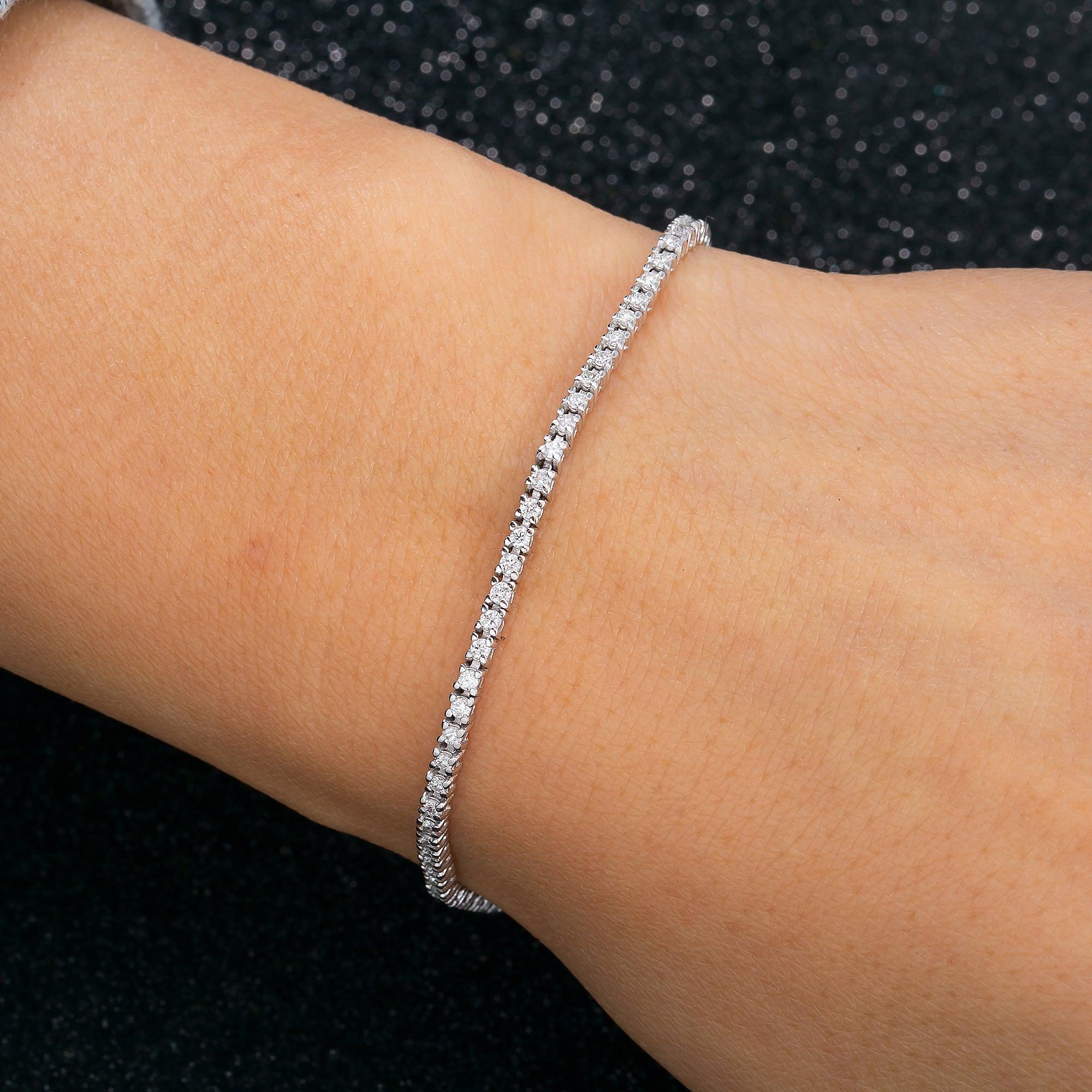 14K WHITE GOLD TENNIS BRACELET WITH 1.04 CT DIAMONDS