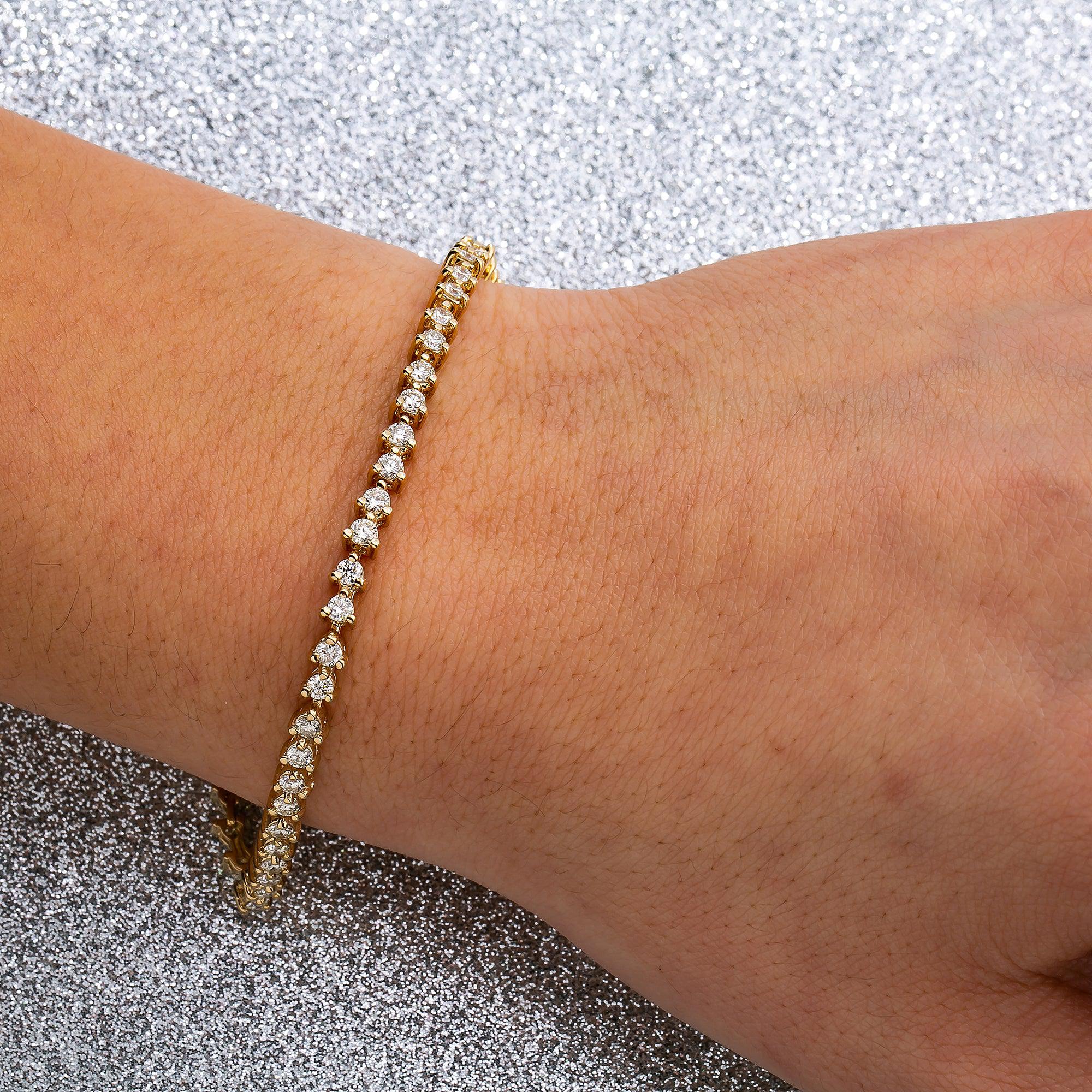 14K YELLOW GOLD LADIES BRACELET WITH 2.60 CT DIAMONDS