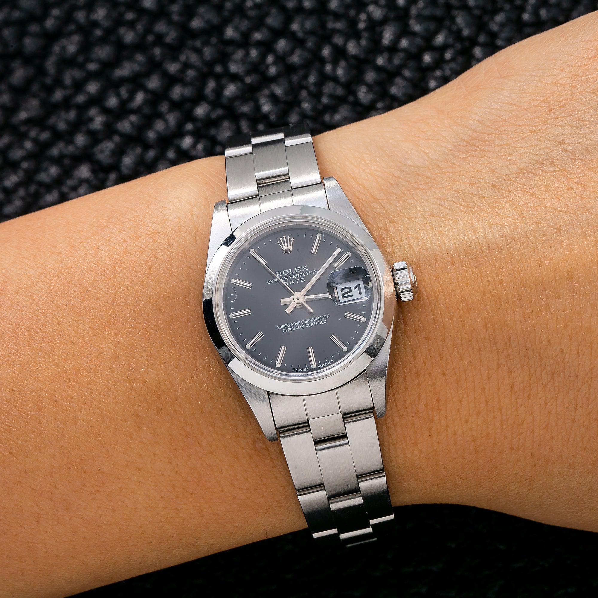 Rolex Date 26MM 69160 Black Dial Smooth Bezel Stainless Steel Oyster Bracelet