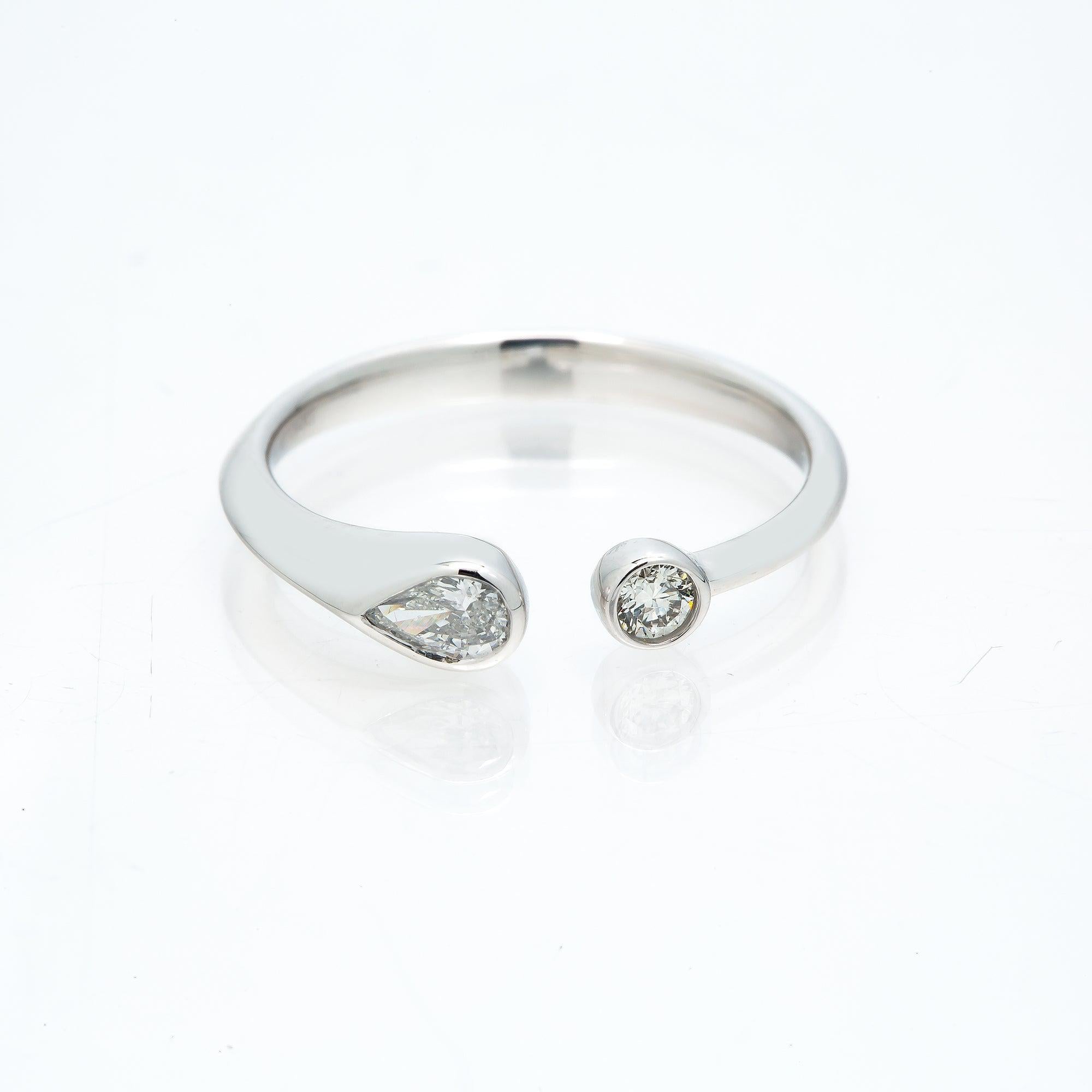 14K GOLD PEAR AND ROUND TWO DIAMOND BEZEL RING 0.25 CT