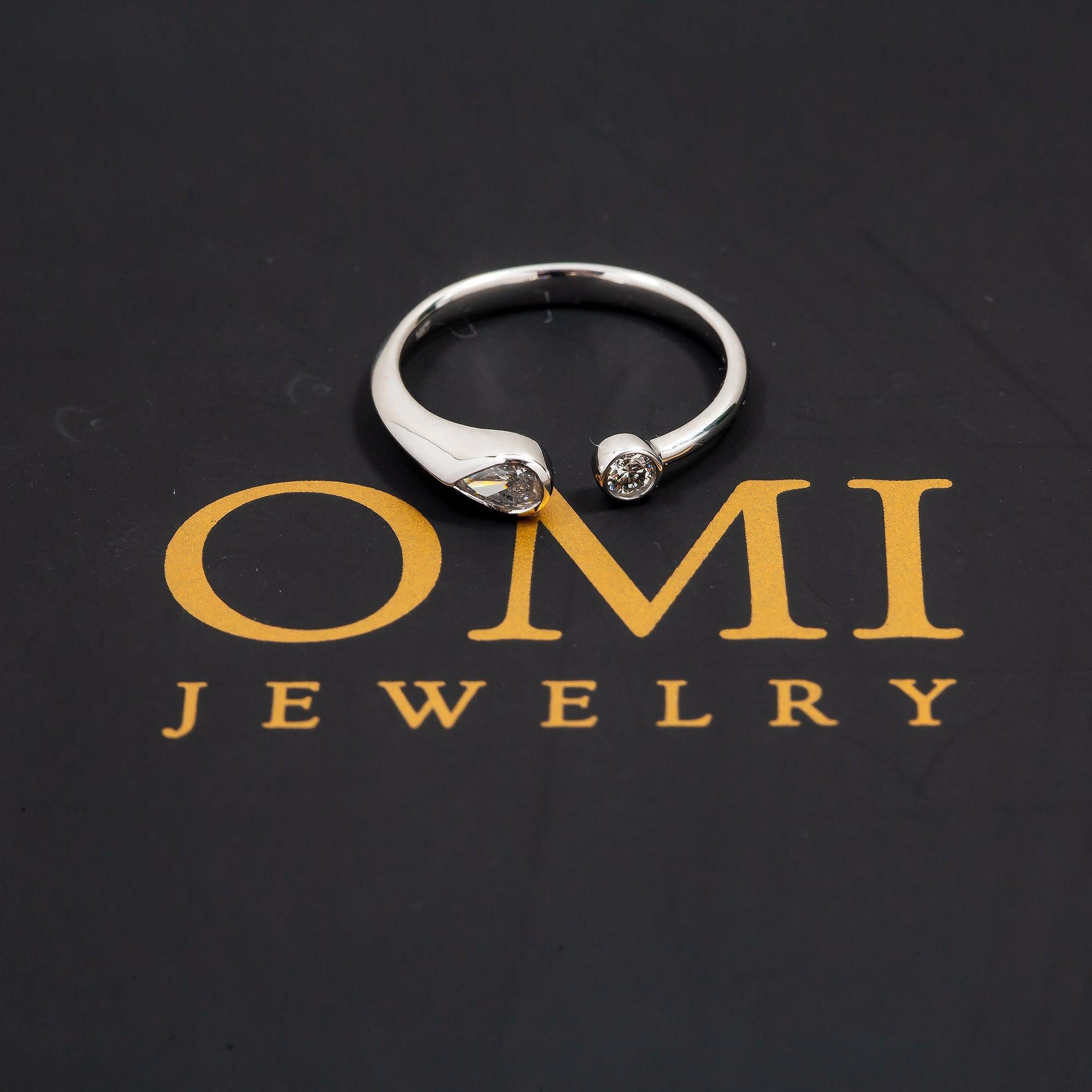 14K GOLD PEAR AND ROUND TWO DIAMOND BEZEL RING 0.25 CT