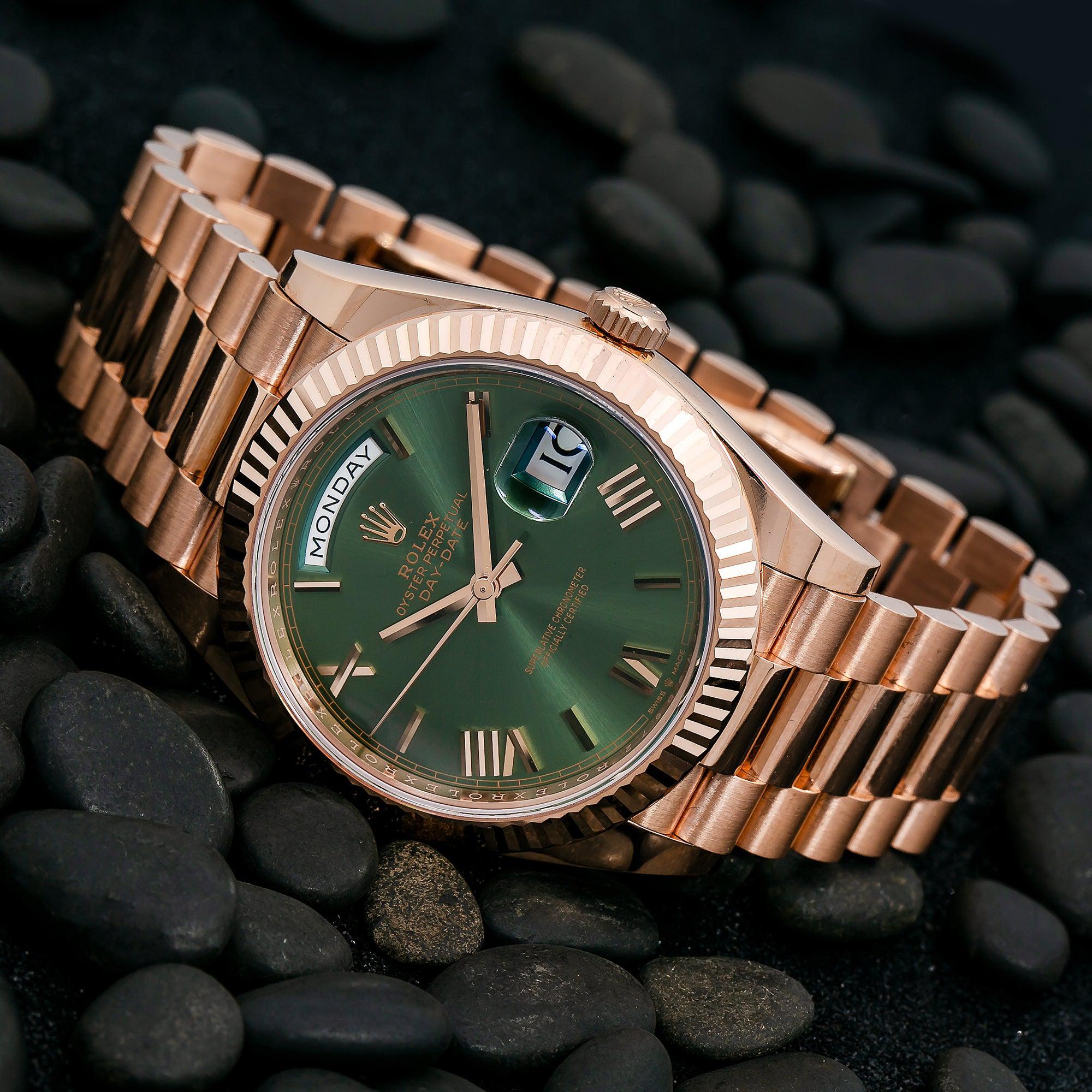 Rolex Day-Date 40MM 228235 Green Roman Dial Fluted Bezel 18K Rose Gold President Bracelet