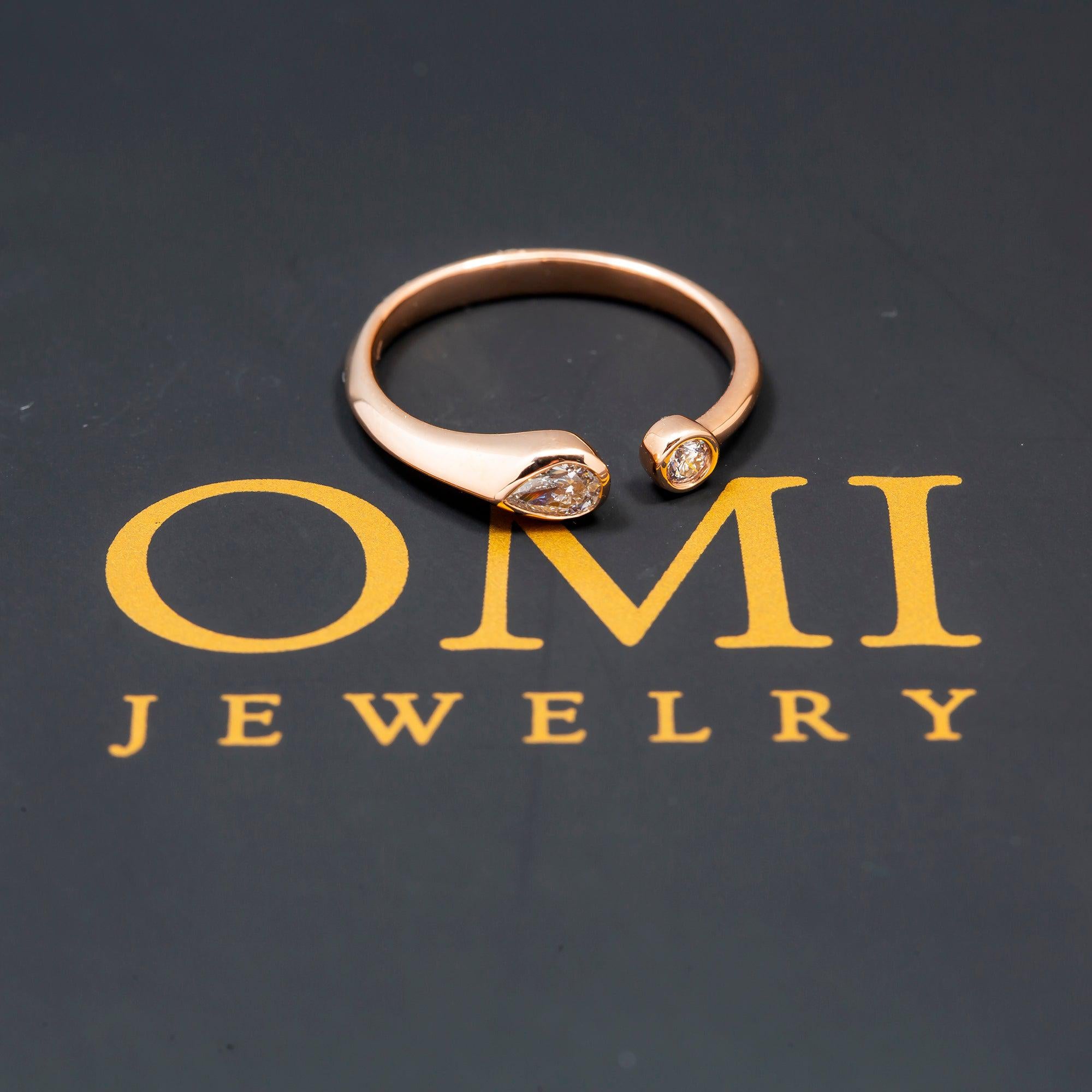 14K GOLD PEAR AND ROUND TWO DIAMOND BEZEL RING 0.25 CT