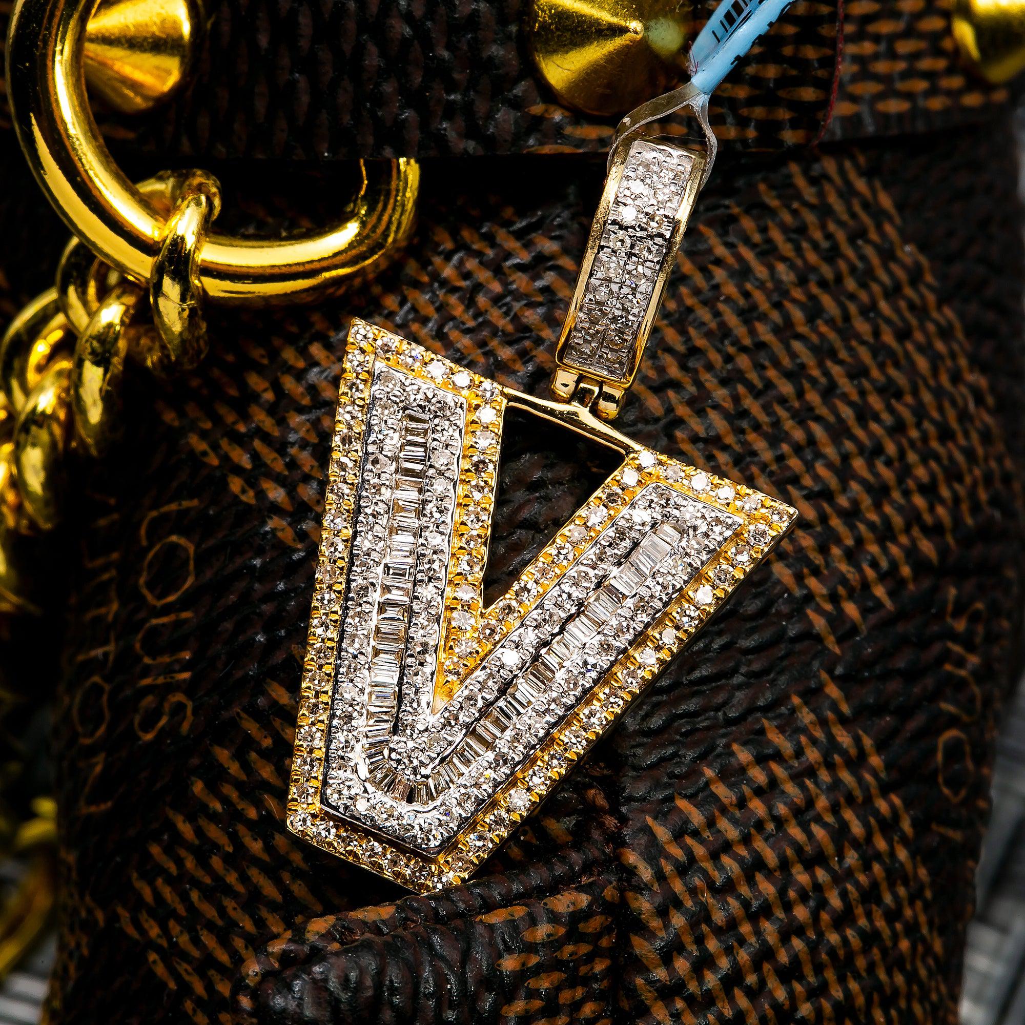 14K YELLOW LETTER V PENDANT WITH 0.60 CT DIAMONDS