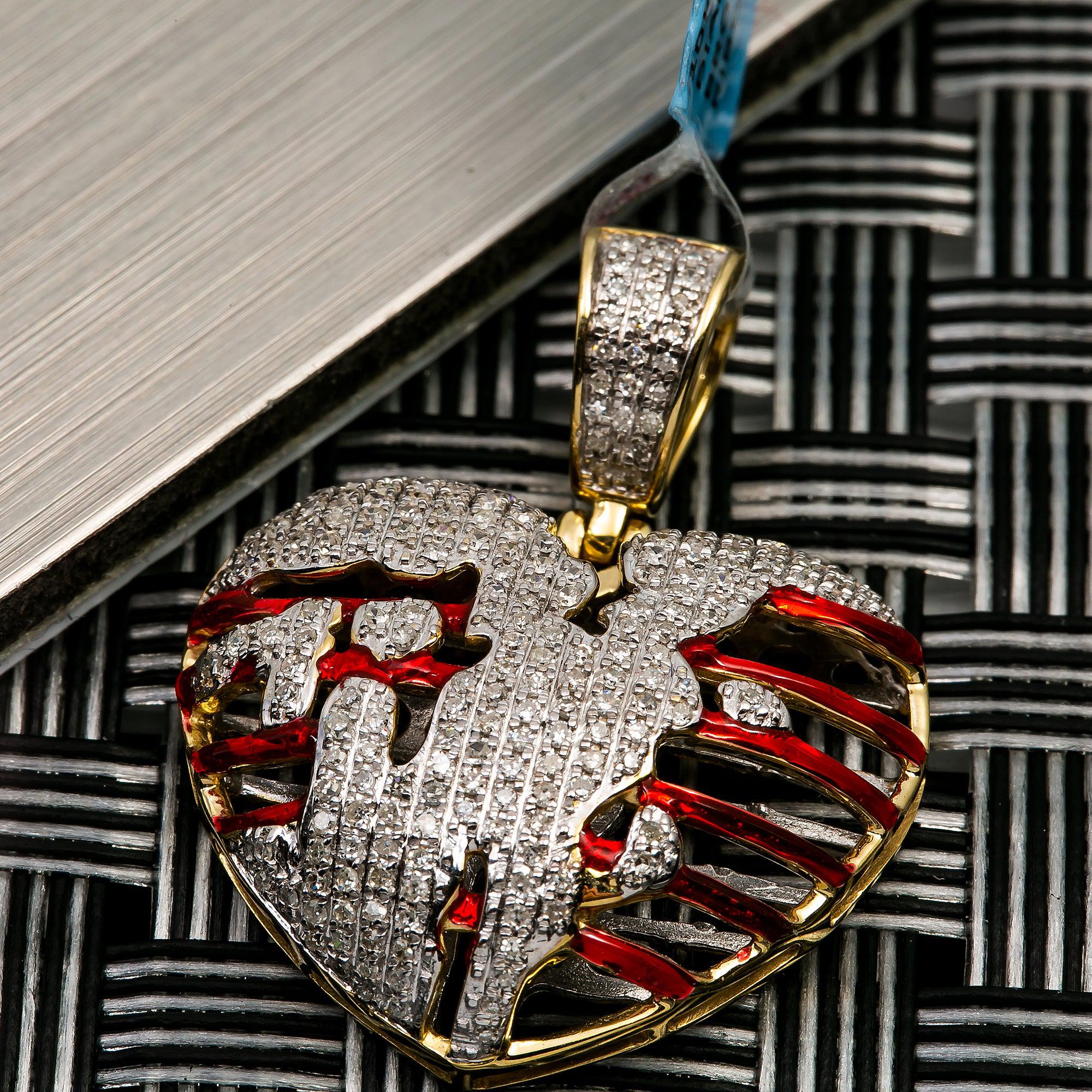 10K YELLOW GOLD BROKEN HEART RIBCAGE PENDANT WITH 0.70 CT DIAMONDS