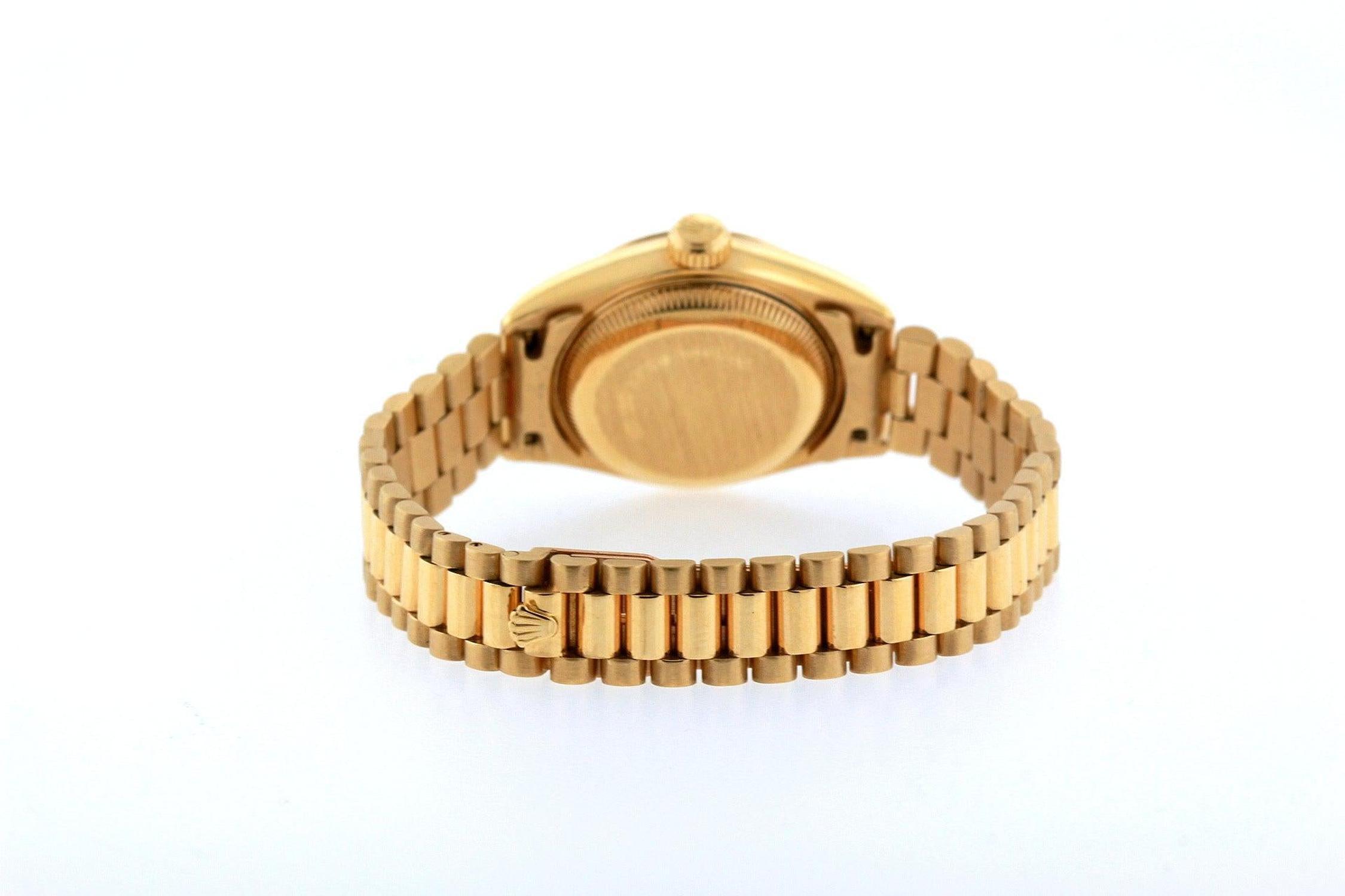 Rolex Datejust 26MM 69178 White Mother of Pearl Roman Dial Fluted Bezel 18K Yellow Gold President Bracelet