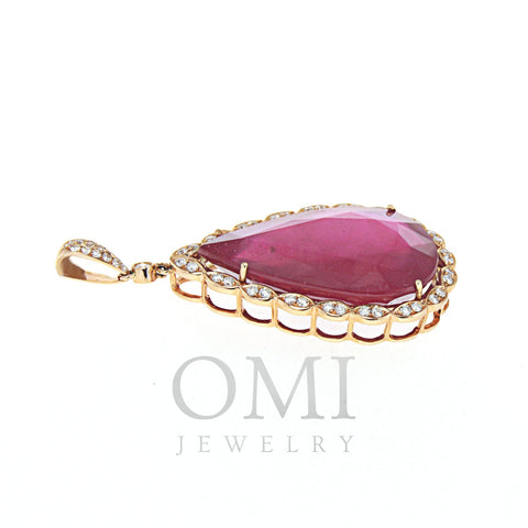 Rose Gold Pendant with Diamonds and Pear Shaped Ruby Center